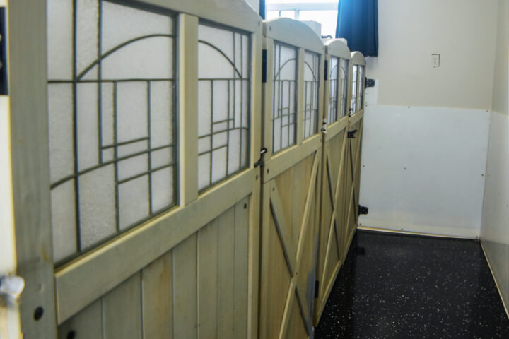Wooden stable doors in a row.