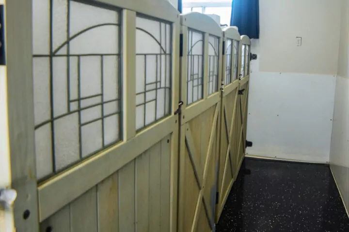 Wooden stall doors in a barn interior